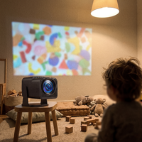 Mini projector on a stool projecting onto a playroom wall